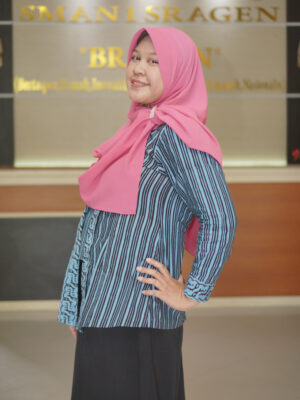 Ayu Candra Dewi, S.Pd (Staff Kurikulum)
